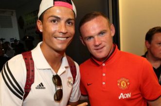 Wayne Rooney Sayangkan Bila Cristiano Ronaldo Gabung ke Manchester City. - Foto: Wayne Rooney dan Cristiano Ronaldo.(Getty Images)
