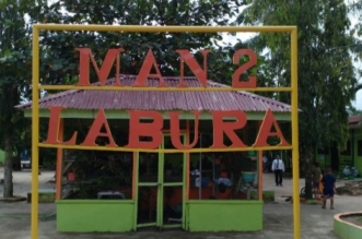 Foto: Sekolah Madrasah Aliyah Negeri 2 (MAN 2) di Desa Damuli Kebun, Kecamatan Kualuh Selatan, Kabupaten Labuhanbatu Utara (Labura), Sumatera Utara.(Dok)